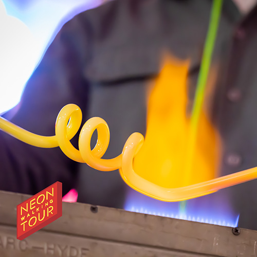 yellow glass tube in a flame